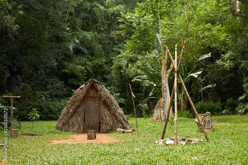 Obraz na plátně Traditional Taino Indigenous Village in the Lush Jungle of Viñales Valley, Cuba