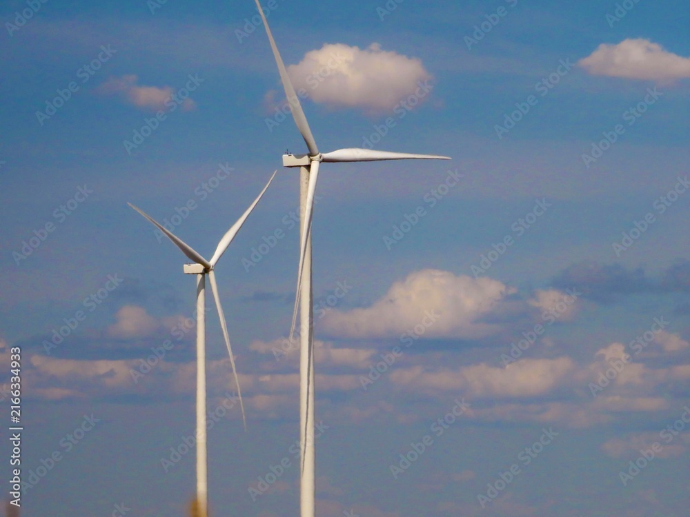 Fototapeta premium wind turbine on blue sky