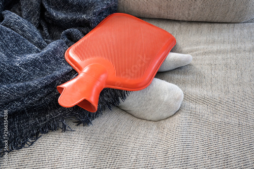 Cuadro en lienzo Hot water bottle, a warm foot warmer for a cold day.