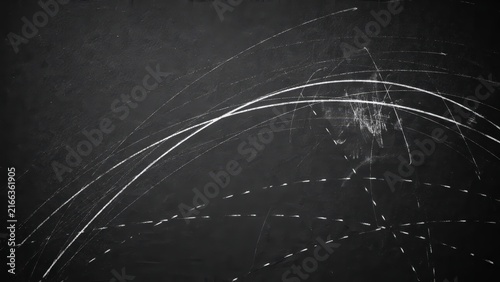 Abstract chalk streaks on blackboard background for design and creative projects.