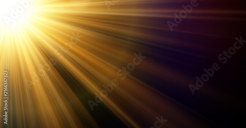 Bright top left sunburst with diagonal golden light rays on dark background