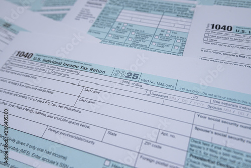 US Individual Income Tax Return Form 1040 Blank Documents for Annual Filing and Accounting Concept