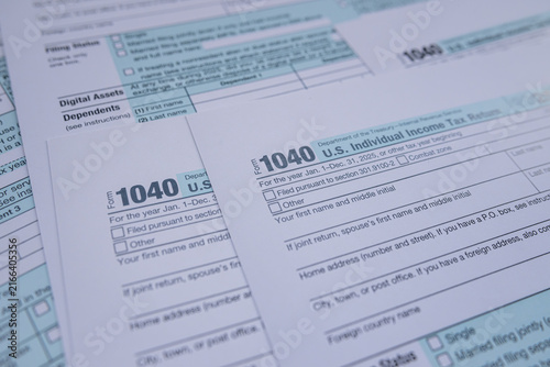 US Individual Income Tax Return Form 1040 Blank Documents for Annual Filing and Accounting Concept