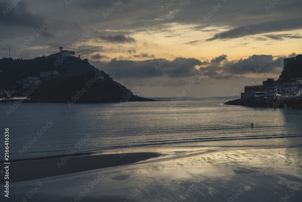 Fototapeta premium Golden Sunset over La Concha Bay and Beach in San Sebastian, Basque Country, Spain