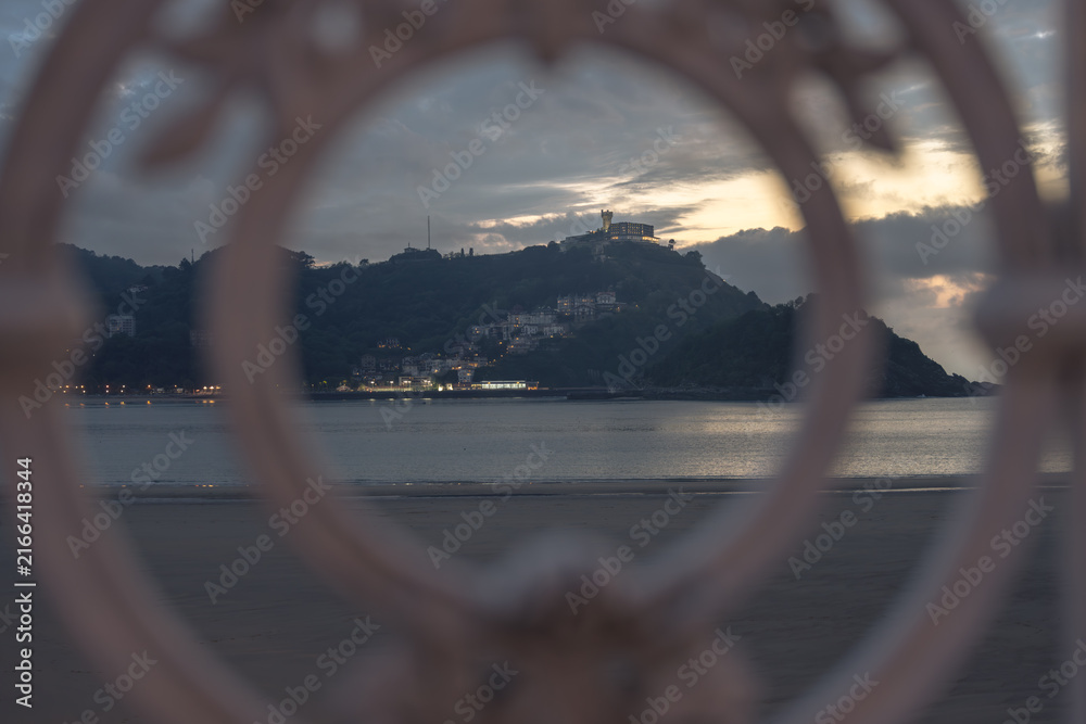 Fototapeta premium Golden Sunset over La Concha Bay and Beach in San Sebastian, Basque Country, Spain
