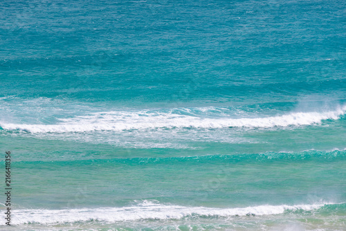 Panoramic view of the turbulent turquoise waves of the Atlantic Ocean – Canary Islands, Fuerteventura; background or wallpaper for your project