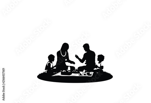 Family silhouette enjoying a picnic on a circular grass patch