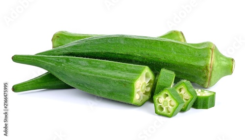 Fresh green cucumbers arranged on white background.