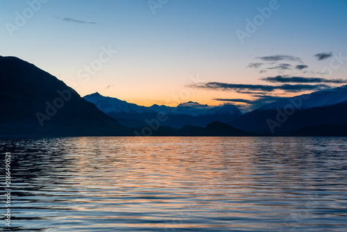 Sunset view of lake and mountain in New Zealand.