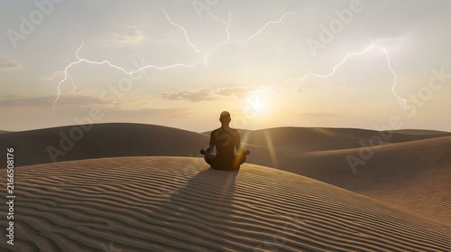 Person Sitting Cross-Legged on Desert Sand Dunes During Lightning Storm at Sunrise