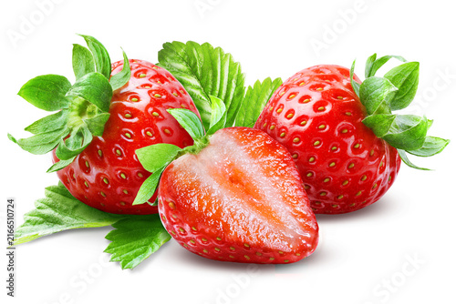 Obraz na płótnie Sliced strawberry half placed in front of two whole berries with green leaves and sepals isolated on transparent background
