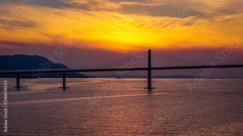 Peljesac Bridge over Adriatic Sea at sunset