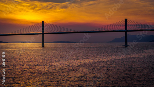 Peljesac Bridge over Adriatic Sea at sunset
