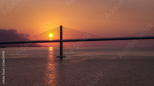 Peljesac Bridge over Adriatic Sea at sunset