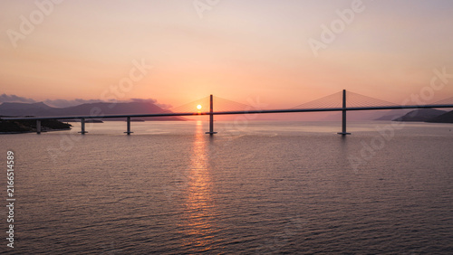 Peljesac Bridge over Adriatic Sea at sunset