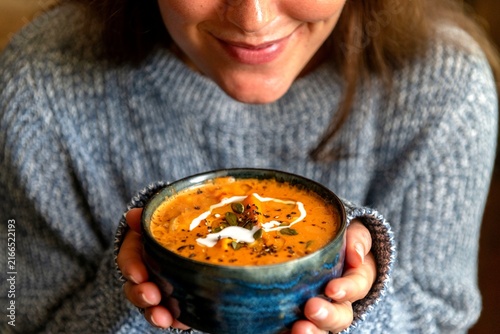 Cozy soup in blue bowl.