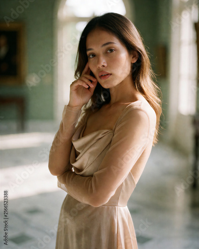 Elegant Woman in Soft Draped Dress