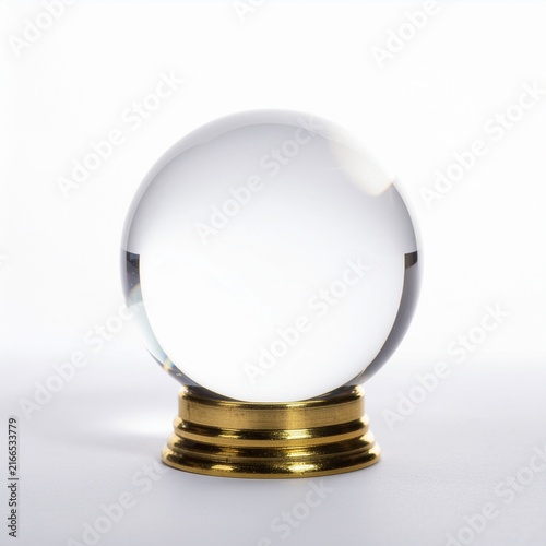 Crystal ball with brass stand isolated on white background