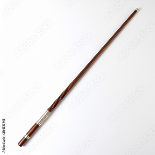 Wooden walking stick with silver details isolated on white