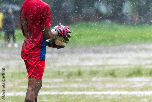 Photography Close-up of soccer goalkeeper running to take goalkeeper volley