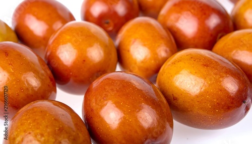 Fresh ripe oranges in a close up cluster.