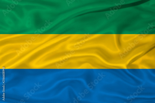 Flag of Gabon with a soft fabric texture. Gabonese flag textured with fabric background