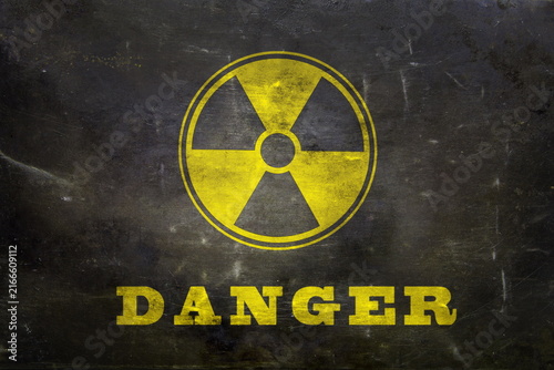 radiation hazard sign on grunge background