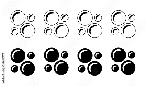 Foto A collection of black and white bubble arranged in rows, featuring both outline