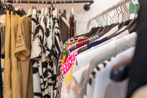 Fashion clothing collection displayed on boutique garment racks