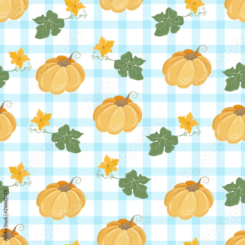 Seamless pattern with orange pumpkins, pumpkin flowers and leaves on blue gingham background