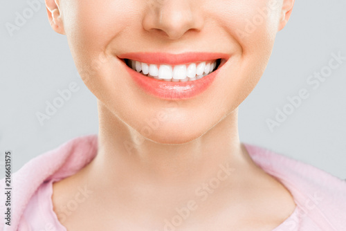 Perfect White Smile of a Young Woman Close Up