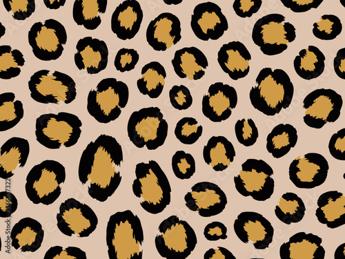 Seamless leopard print pattern featuring classic black and gold animal spots on a soft beige background texture