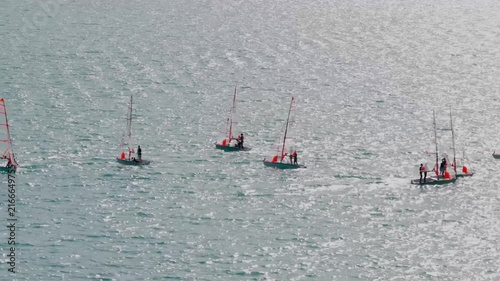 Yachts Competing in a Scenic Alpine Lake Regatta in Switzerland
