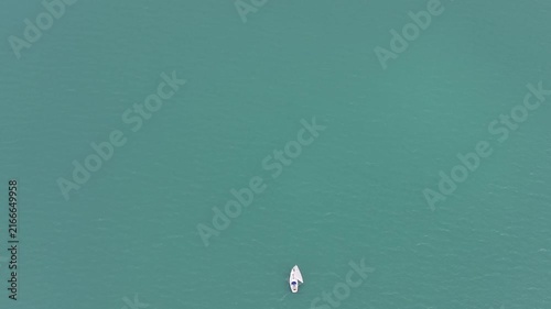 Sailing Competition on a Blue Lake in the Swiss Alps