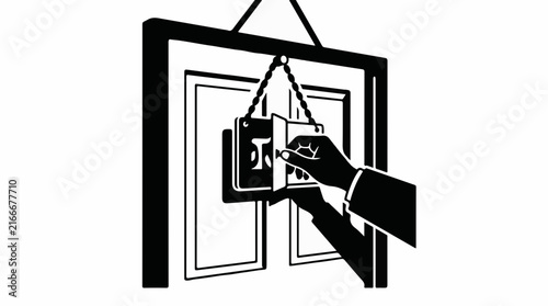 Hand flipping a sign on a glass door