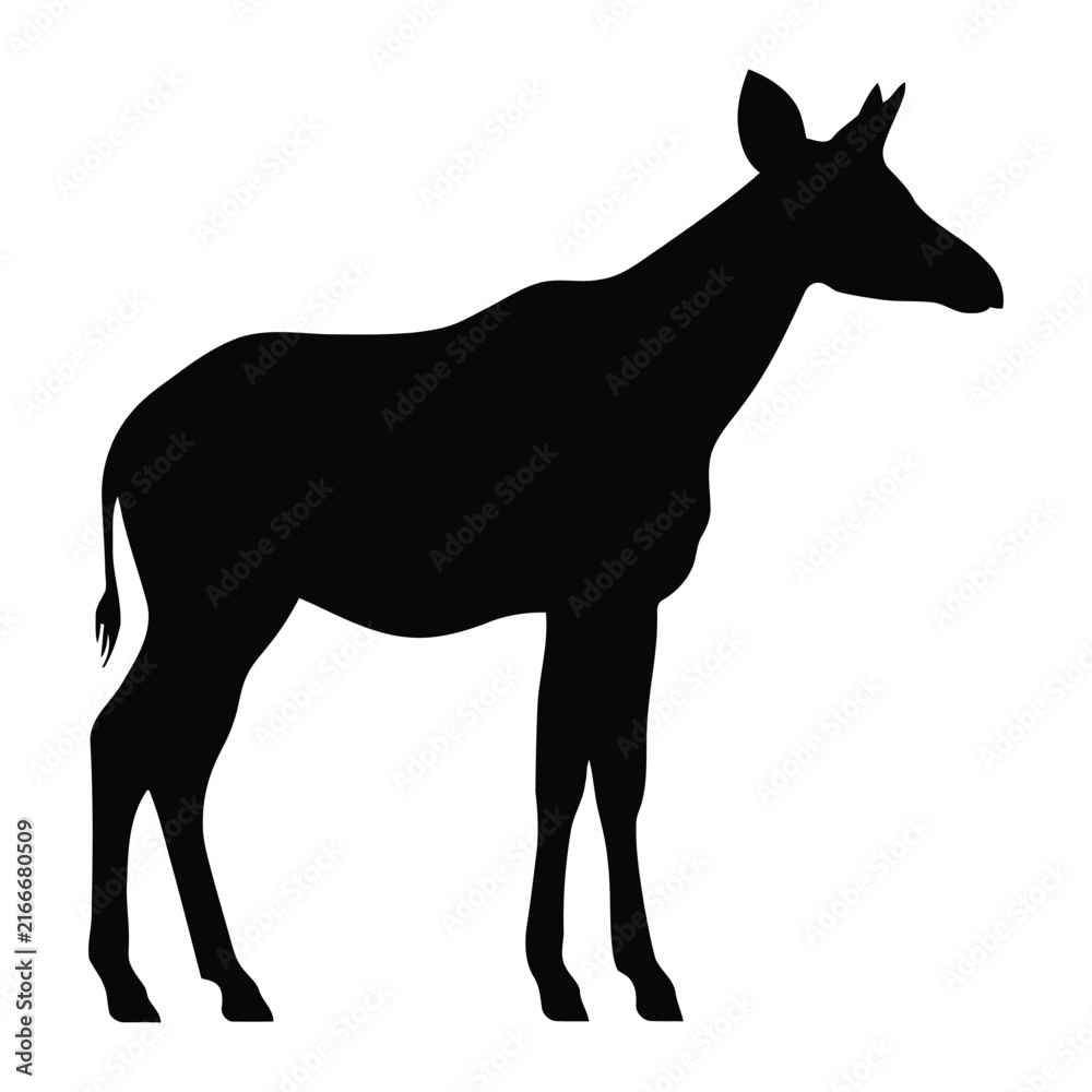 Fototapeta premium A black silhouette of a young antelope stands in profile a striking outline silhouette