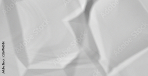Fotografie Soft white abstract background with polygonal shapes and smooth transitions, creating a clean and modern aesthetic for designs