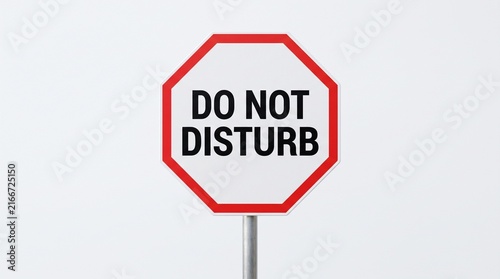 Do not disturb sign with red and white octagonal frame for privacy.