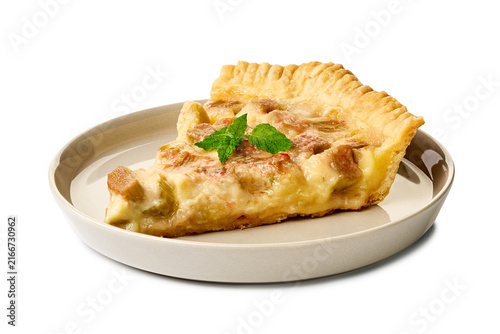 Slice of homemade rhubarb tart with flaky golden crust on ceramic plate, with rhubarb, tart, slice, crust detail, showing pastry, bakery, dessert, plate context