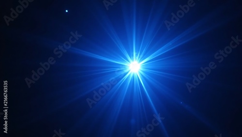 Bright Blue Starburst Effect Against Dark Background.