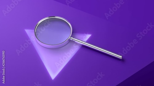 Magnifying glass resting on purple geometric surface with reflective metal handle