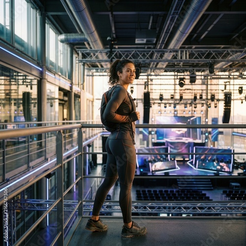 Energetic Woman Ready For Fitness Event Or Performance In Modern Venue