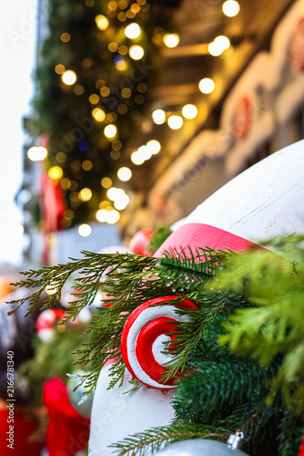 Fotografía Decorations adorn a Christmas festive street during the holiday season with brig