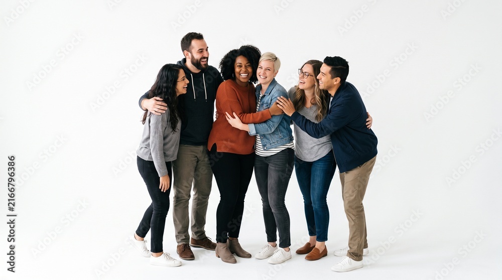 Obraz premium Diverse group of friends hugging and laughing together on white background