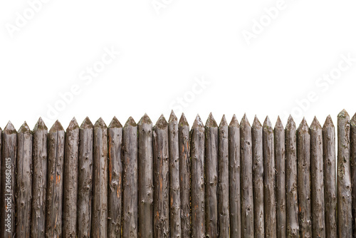 Foto Weathered wooden palisade fence with sharpened pointed log stakes isolated on white background, cutout stock asset