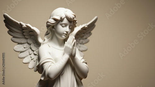 White angel statue with detailed wings and serene prayerful pose, classical sculpture for religious or spiritual theme, indoor display