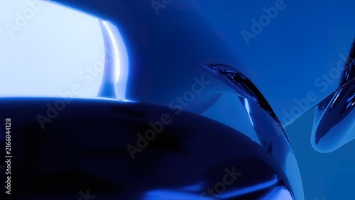 Close-up of glossy metallic liquid droplet forming abstract reflective surface in vibrant blue lighting