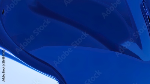Abstract blue metallic liquid paint swirl texture with glossy reflective surface and dynamic motion flow