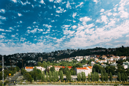 Photography Panoramic daytime view of the Oslo skyline and surrounding hills.