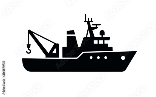 Silhouette of a large industrial ship with a crane on deck.